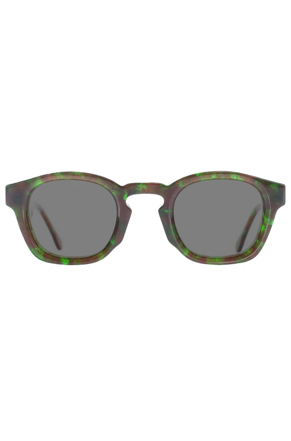 Sunglasses with a green and brown frame on a white background