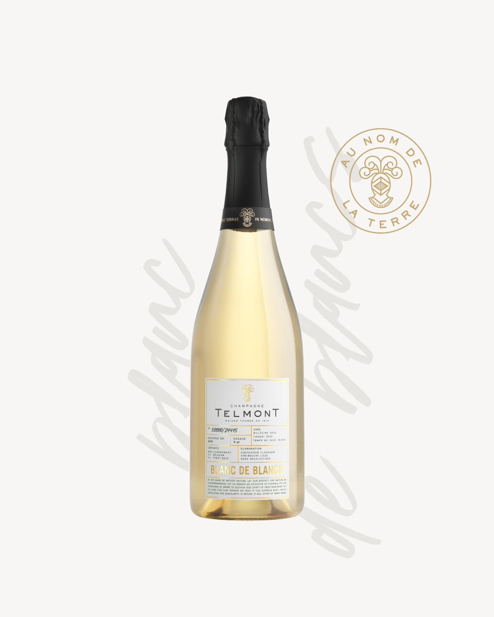 Open image in slideshow, Packshot of champagne bottle with text and stamp, on a white background
